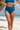 High Waist Swim Bottom in Ocean Blue - Front standing pose on tropical beach